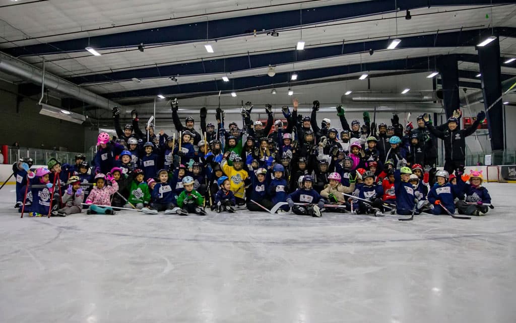 Group of youth hockey players at a camp